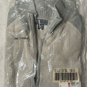 Ralph Lauren men’s zip up sweater, three XL and gray.